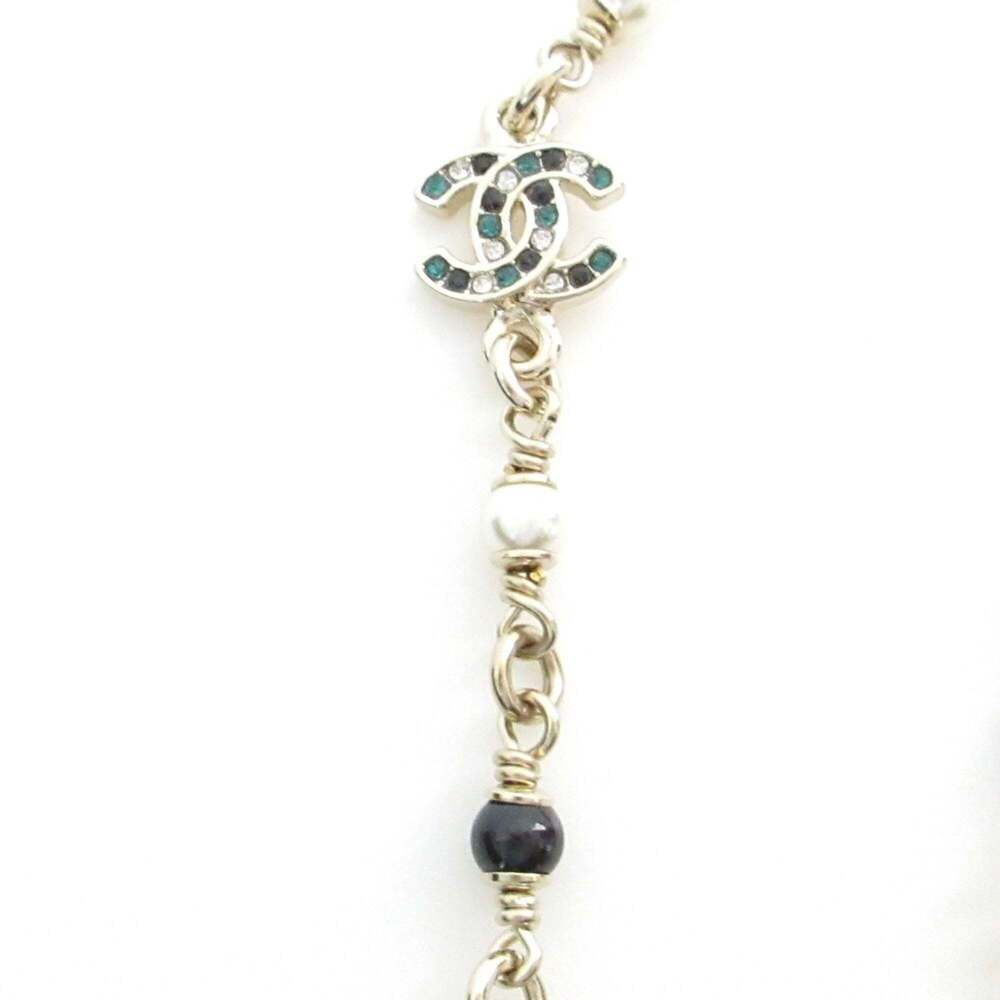 CHANEL Gold Pearl Logo Necklace - Picture 4 of 11